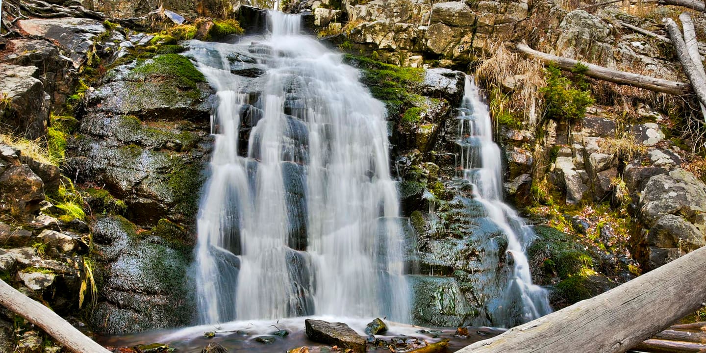 Memorial Falls pouring over mossy rock